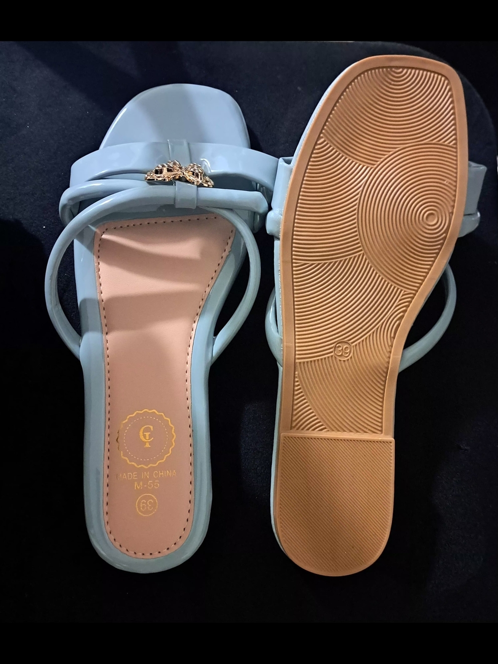 Women’s Pale Blue Strappy Slide Sandals with Gold Emblem